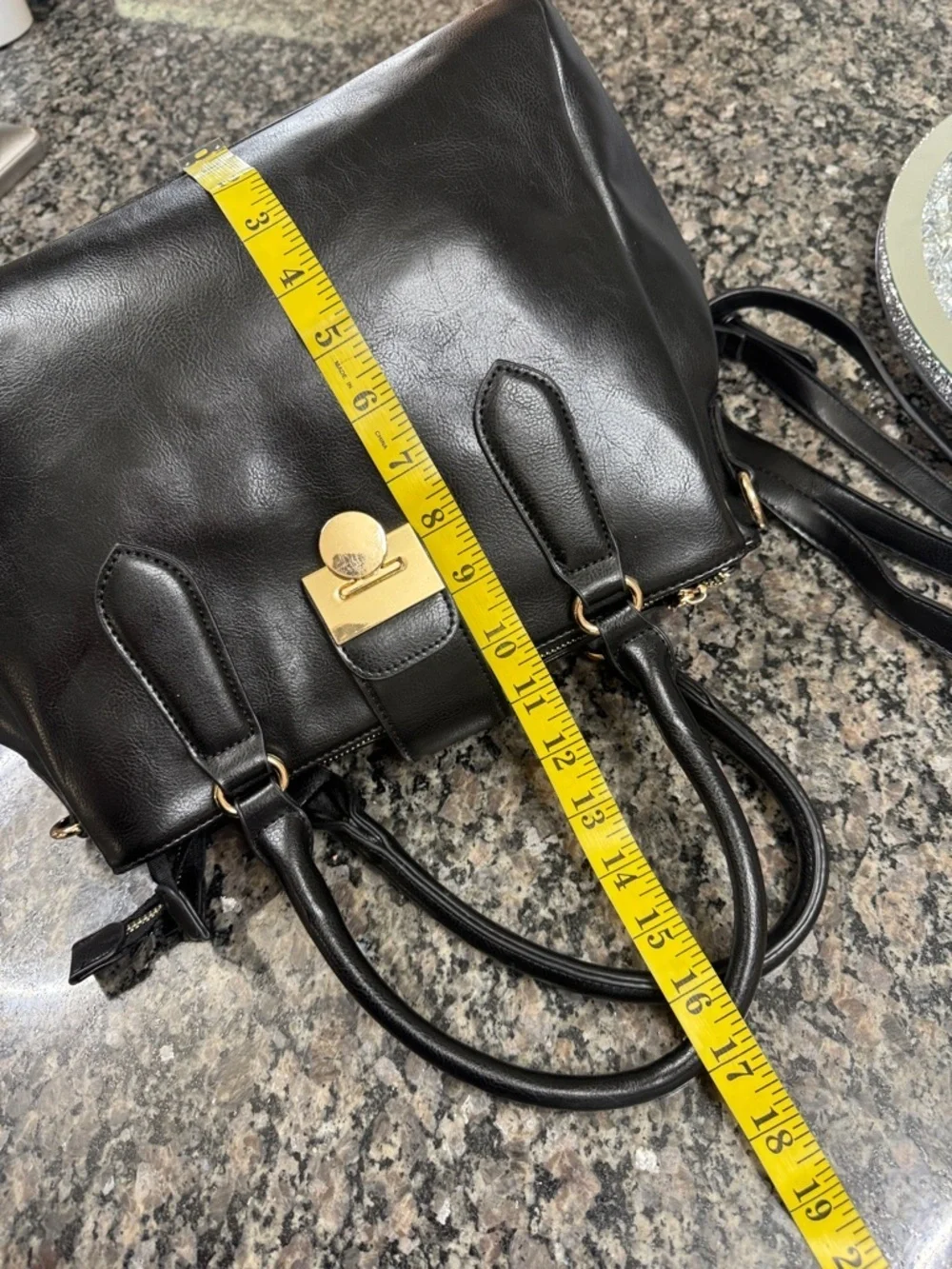 Women's Black Leather Satchel with Gold-Tone Lock and crossbody strap EUC
